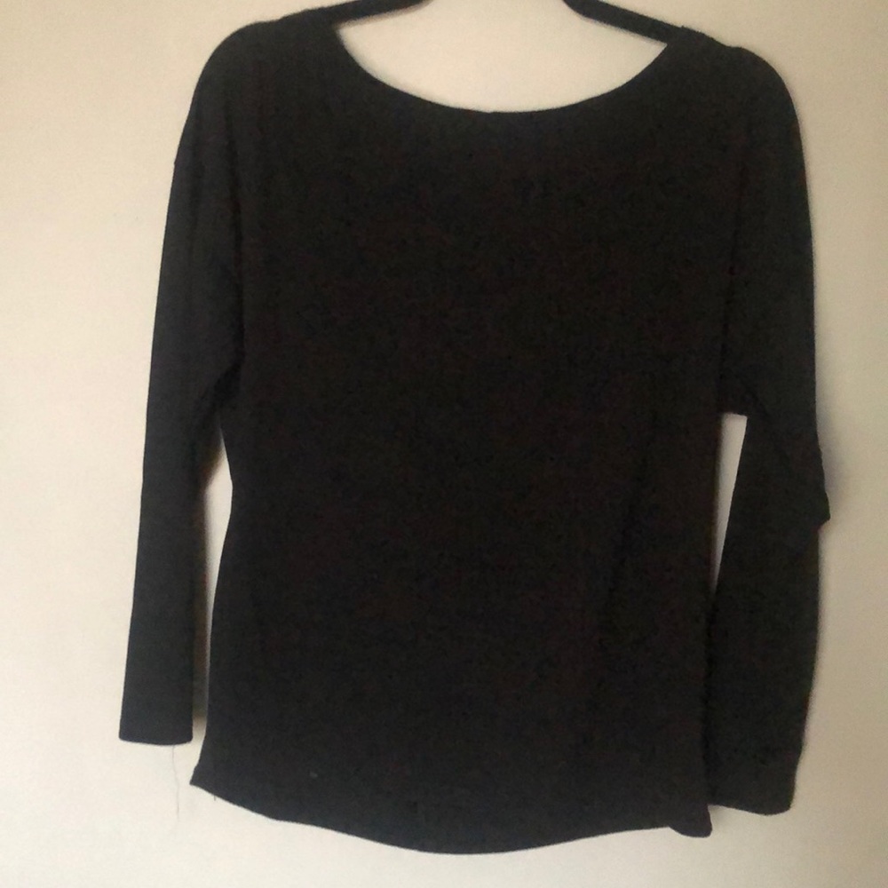 Black long sleeve with open criss/cross back.